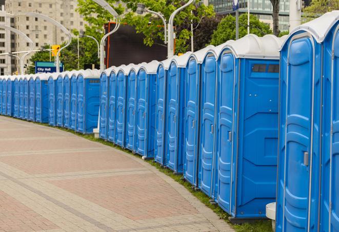 a row of portable restrooms at a fairground, offering visitors a clean and hassle-free experience in crane